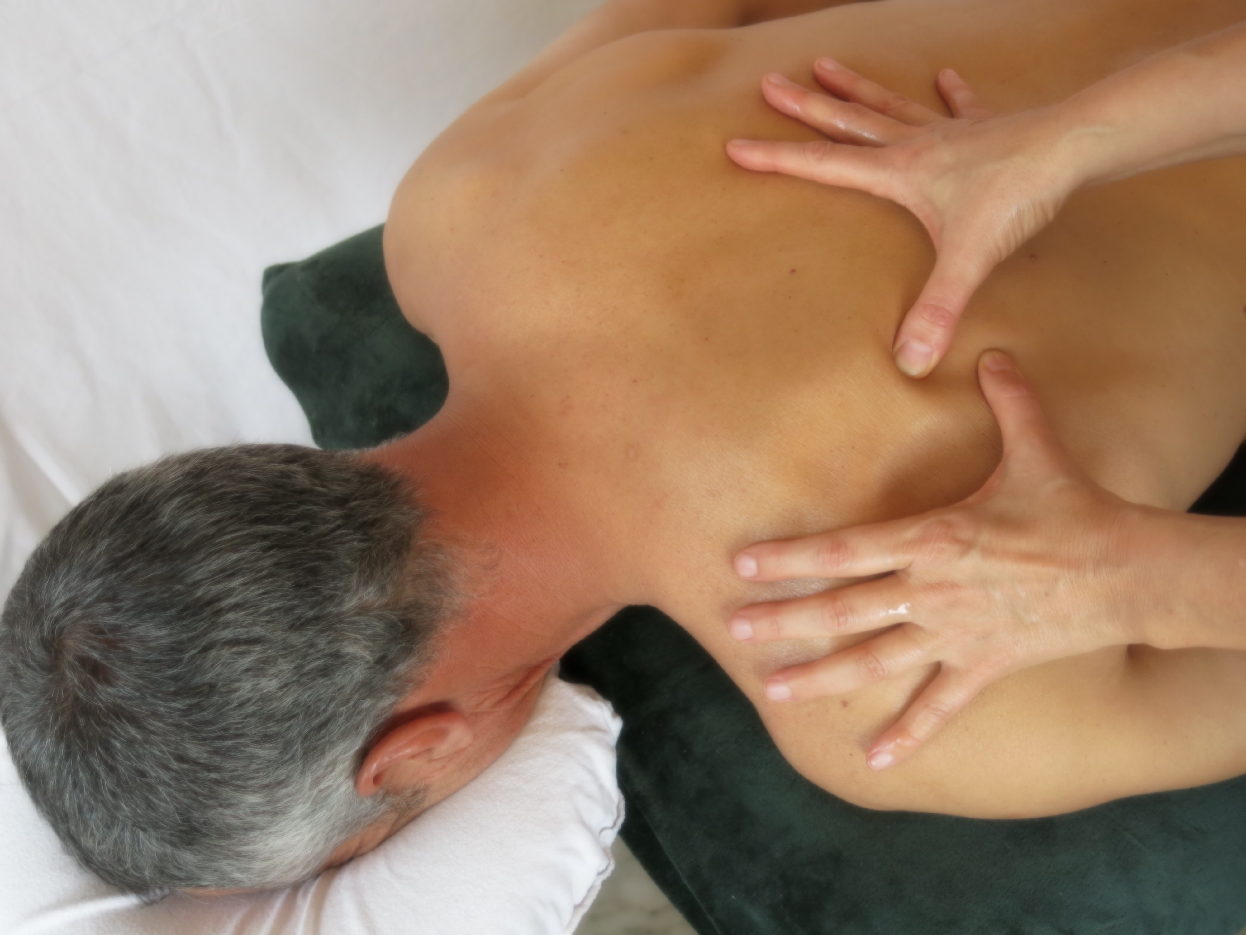 Releasing tension around the shoulder blade